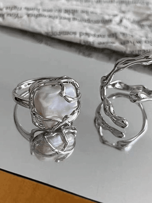 Anneau de manchette géométrique irrégulier