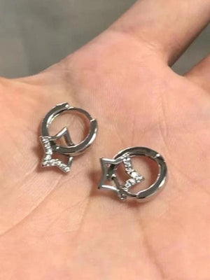 Boucle d'oreille créole en strass étoile creuse