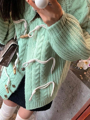 Cardigan à boucle en corne au design torsadé vintage