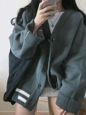 Cardigan en tricot rayé boutonné