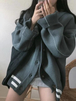 Cardigan en tricot rayé boutonné