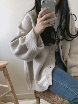 Cardigan en tricot rayé boutonné