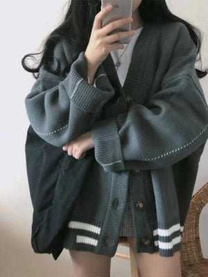 Cardigan en tricot rayé boutonné