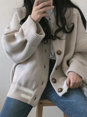 Cardigan en tricot rayé boutonné