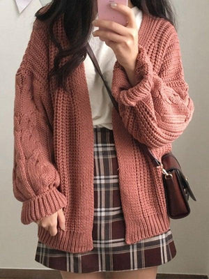 Cardigan ouvert en tricot torsadé
