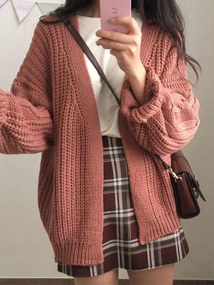 Cardigan ouvert en tricot torsadé