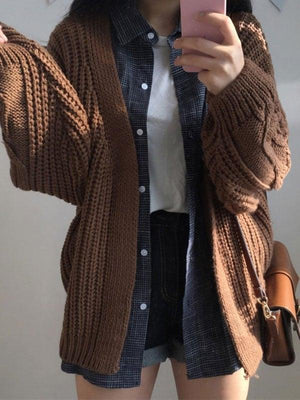 Cardigan ouvert en tricot torsadé