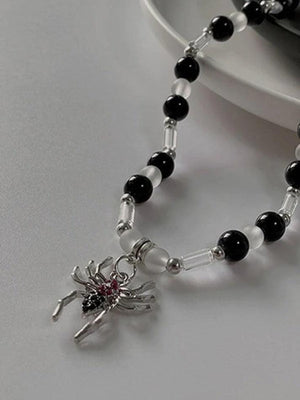 Collier de perles pendentif araignée