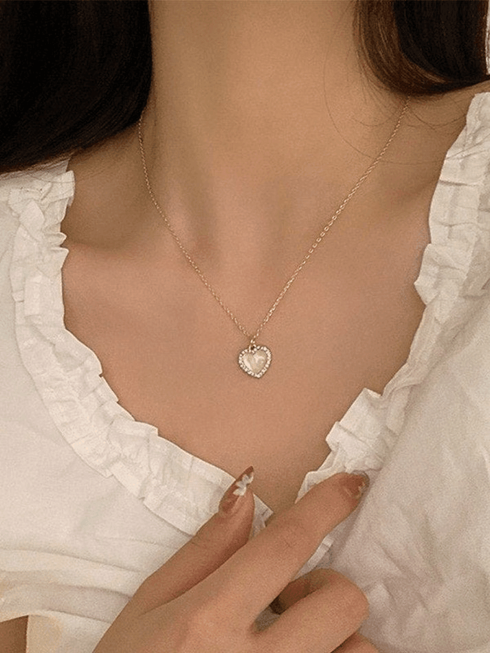 Collier pendentif coeur bord strass