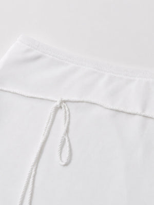 , Y2K skirt styled with a crop top