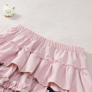 , Y2K skirt styled with a crop top