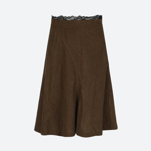 , Y2K skirt styled with a crop top