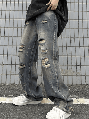 Jean déchiré coupe boyfriend délavé et effiloché