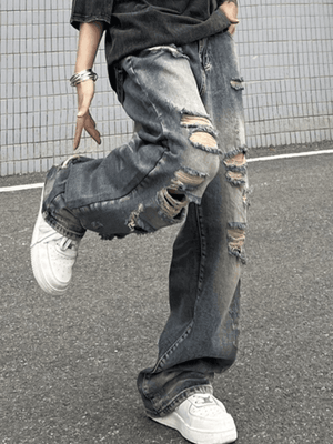 Jean déchiré coupe boyfriend délavé et effiloché