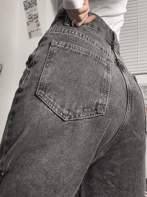 Jean déchiré effiloché délavé vintage