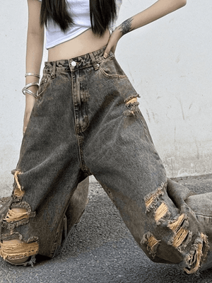 Jean déchiré en denim délavé