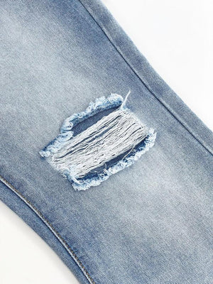 Jean déchiré taille haute effet vieilli