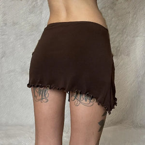 , Y2K skirt styled with a crop top