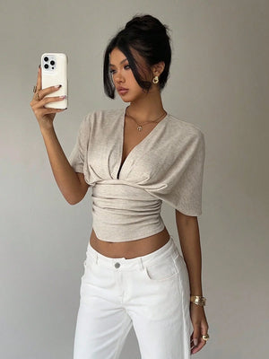 Ruched V Neck Crop Top with cropped cut, Y2K crop top styled with low rise bottoms
