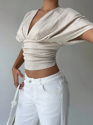 Ruched V Neck Crop Top with cropped cut, Y2K crop top styled with low rise bottoms