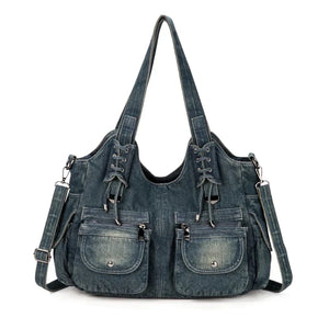Sac Denim Y2K Vintage en jean bleu foncé avec double anse, poches zippées et détails lacés. Parfait pour un style Y2K pratique et tendance.