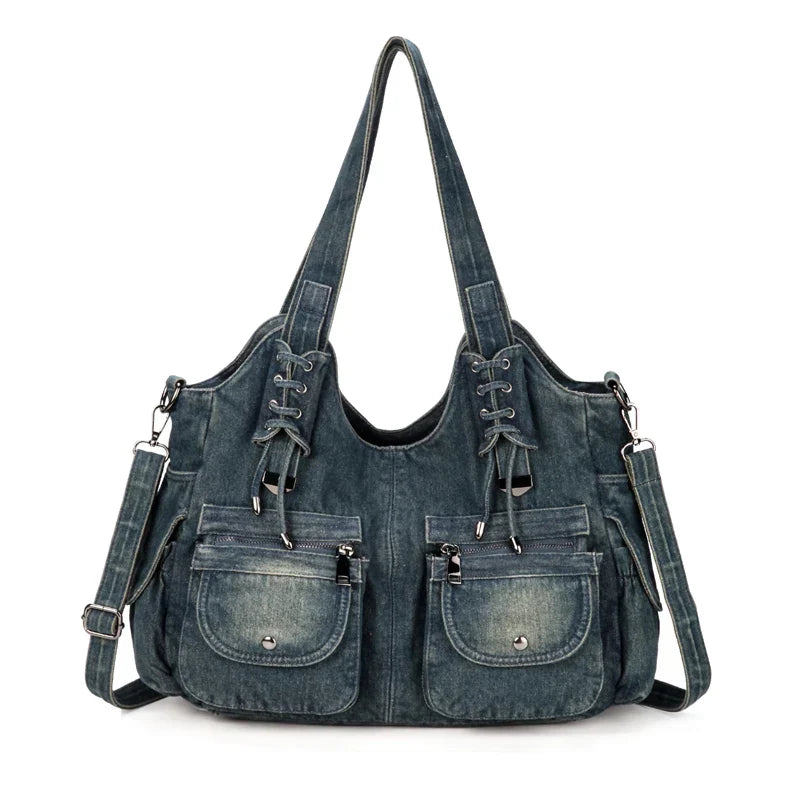 Sac Denim Y2K Vintage en jean bleu foncé avec double anse, poches zippées et détails lacés. Parfait pour un style Y2K pratique et tendance.