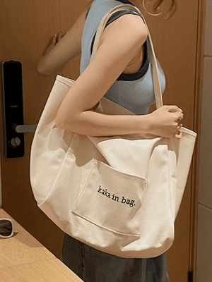 Sac fourre-tout à poche à motif de lettres