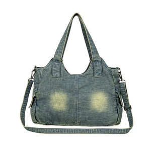 Dos du Sac Denim Y2K Vintage bleu clair avec effet délavé. Bandoulière réglable pour un confort optimal au quotidien.