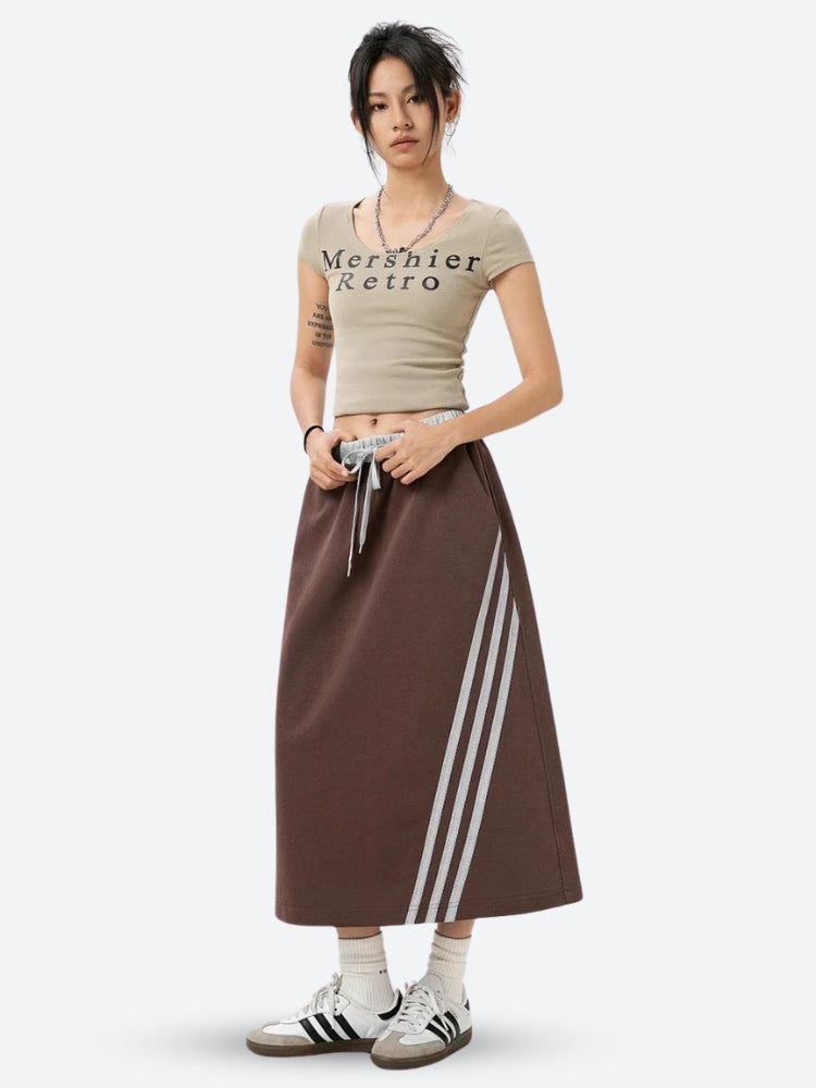 , Y2K skirt styled with a crop top