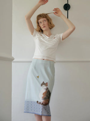 , Y2K skirt styled with a crop top