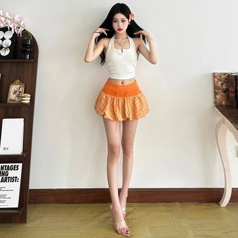 , Y2K skirt styled with a crop top