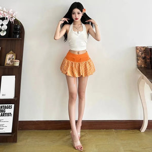 , Y2K skirt styled with a crop top
