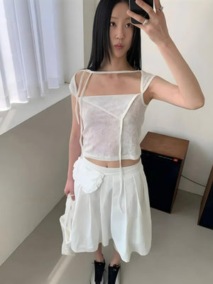 , Y2K skirt styled with a crop top