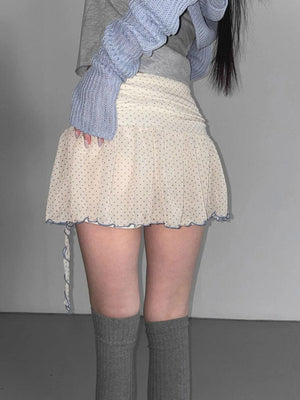 , Y2K skirt styled with a crop top