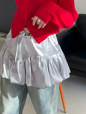 , Y2K skirt styled with a crop top