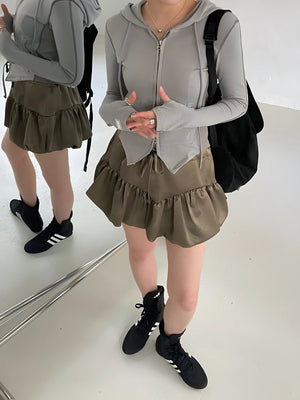 , Y2K skirt styled with a crop top