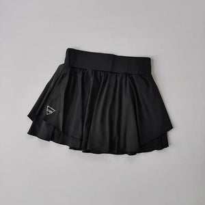 , Y2K skirt styled with a crop top