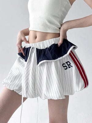 , Y2K skirt styled with a crop top