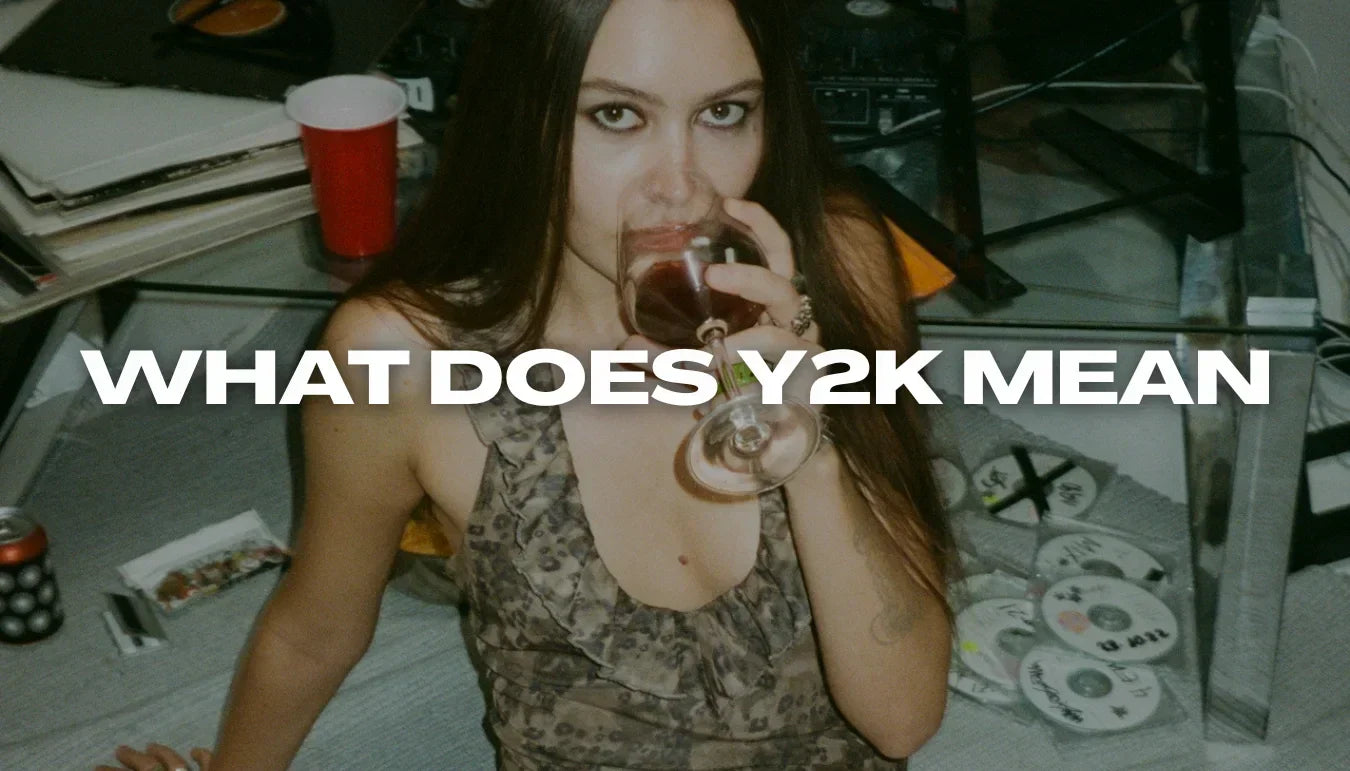 Woman with vintage style sipping wine on the floor surrounded by CDs and electronics – Y2K blog cover by MAUV STUDIO®