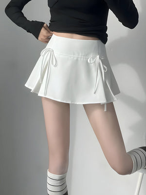 , Y2K skirt styled with a crop top