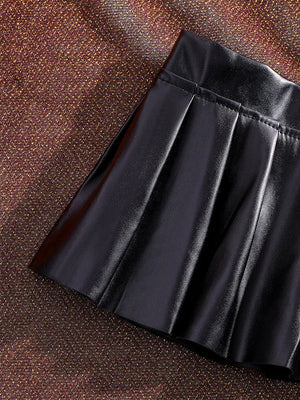 , Y2K skirt styled with a crop top