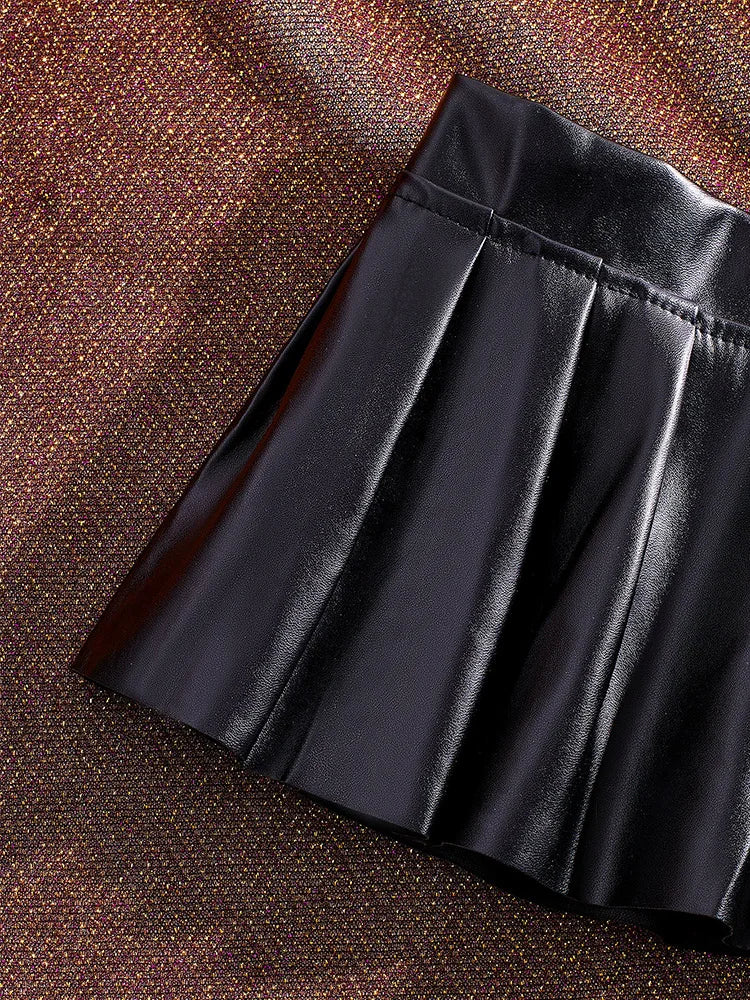 , Y2K skirt styled with a crop top