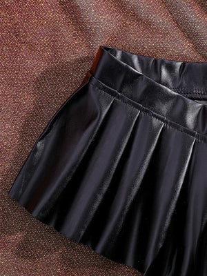 , Y2K skirt styled with a crop top