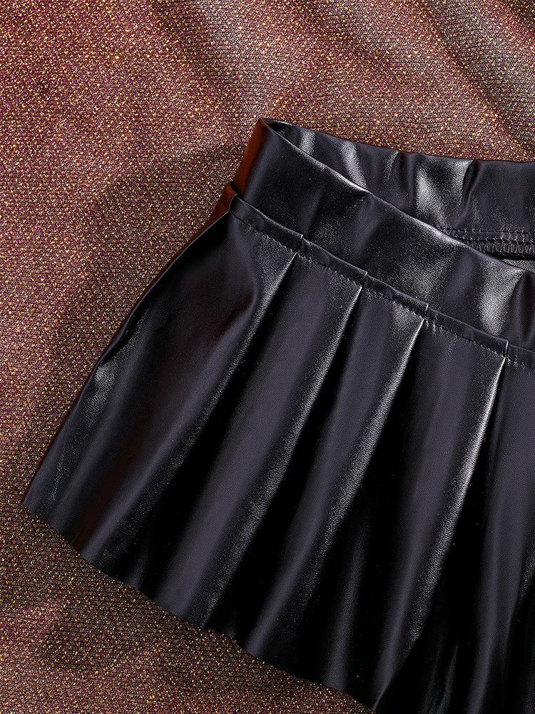, Y2K skirt styled with a crop top