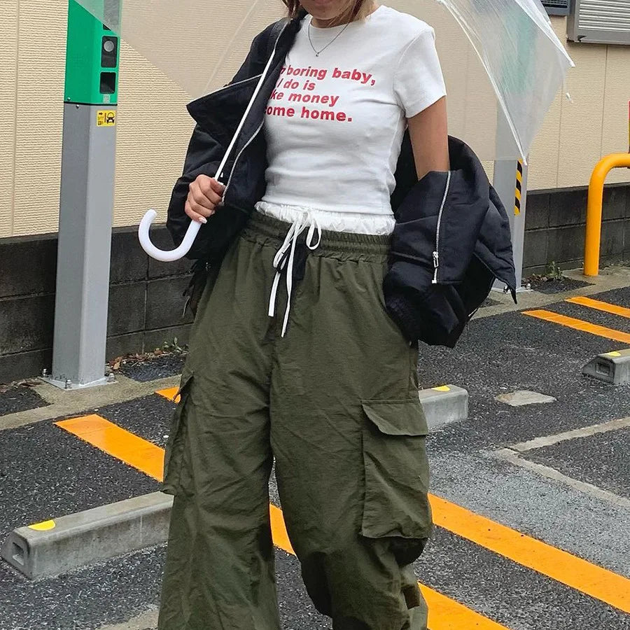 I'm Boring Baby Tee with cropped cut, Y2K baby tee styled with low rise bottoms