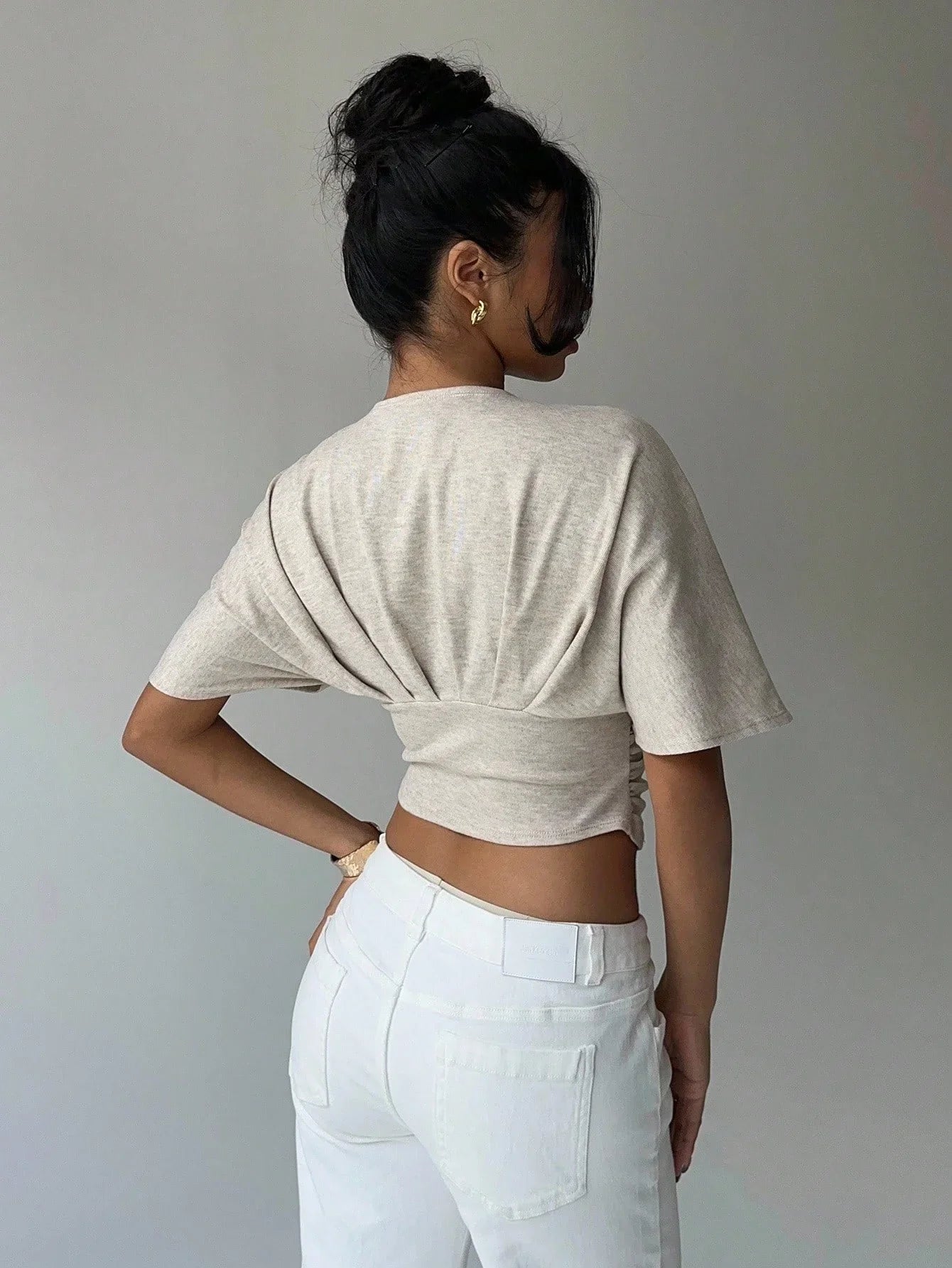 Ruched V Neck Crop Top with cropped cut, Y2K crop top styled with low rise bottoms