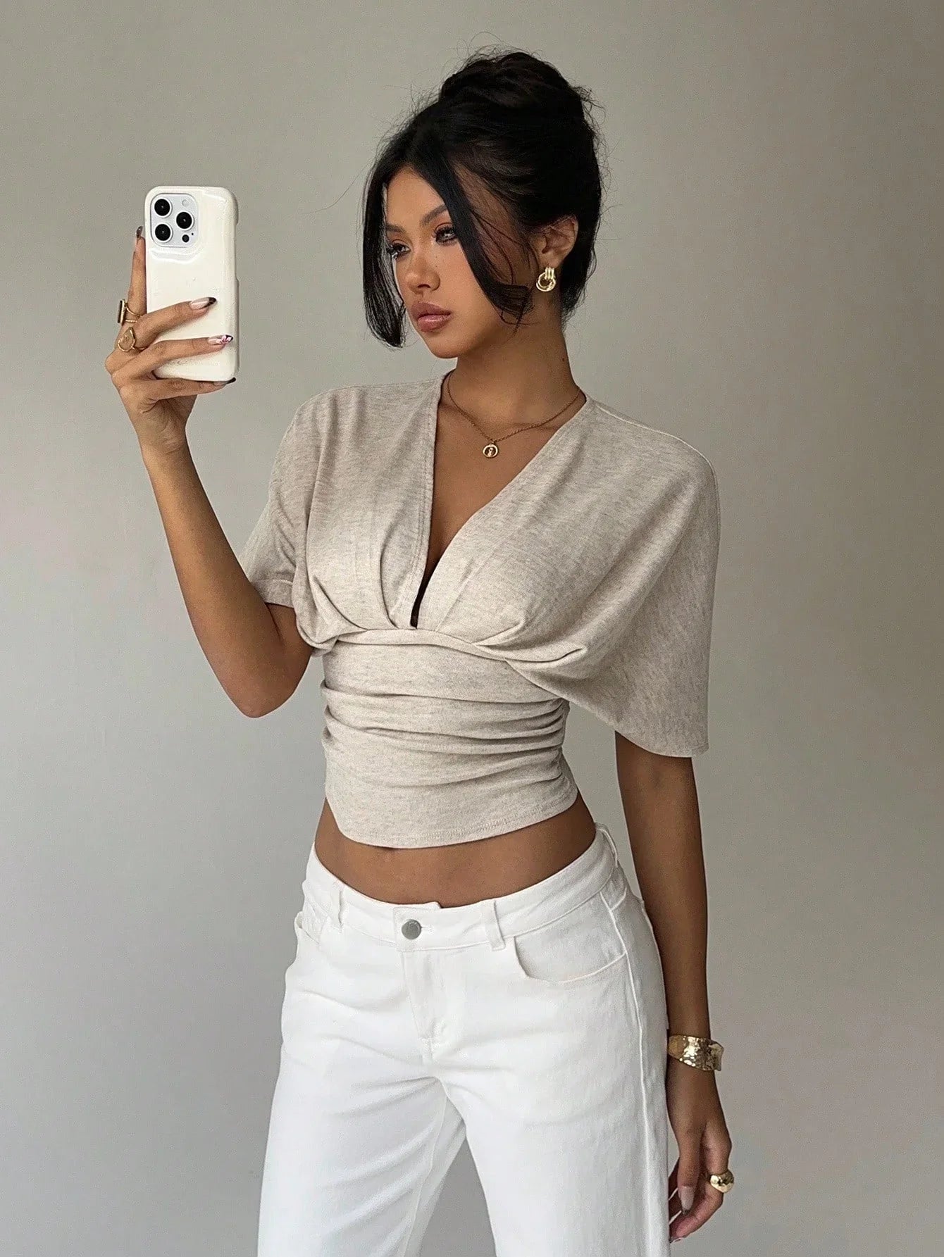 Ruched V Neck Crop Top with cropped cut, Y2K crop top styled with low rise bottoms