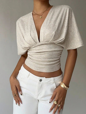 Ruched V Neck Crop Top with cropped cut, Y2K crop top styled with low rise bottoms