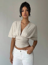 Ruched V Neck Crop Top with cropped cut, Y2K crop top styled with low rise bottoms
