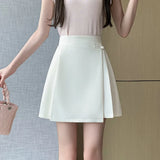 , Y2K skirt styled with a crop top
